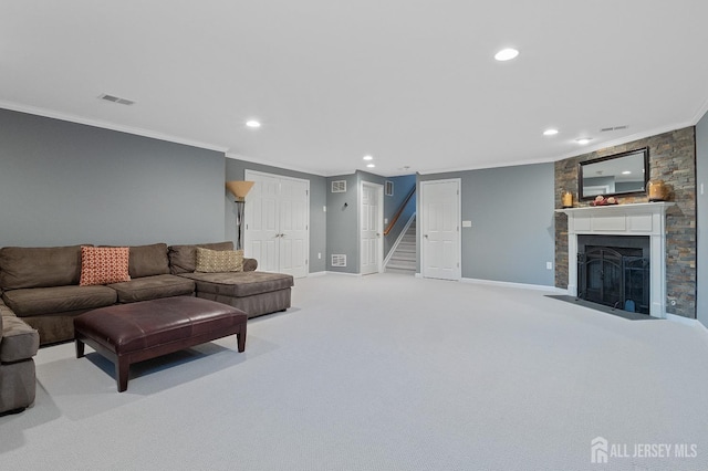 living area with crown molding, a fireplace, stairs, and baseboards