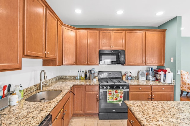 36 Andrews Way, Piscataway, NJ 08854 - kitchen with black appliances, brown cabinetry, light stone countertops, recessed lighting, and light tile patterned floors