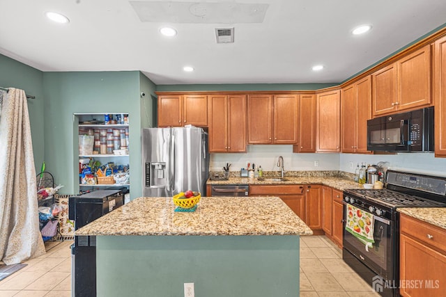 36 Andrews Way, Piscataway, NJ 08854 - kitchen featuring black appliances, light tile patterned flooring, a kitchen island, light stone countertops, and recessed lighting
