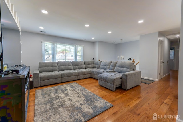 128 Jay St, Middlesex, NJ 08846 - living room featuring light wood-style flooring, recessed lighting, and baseboards