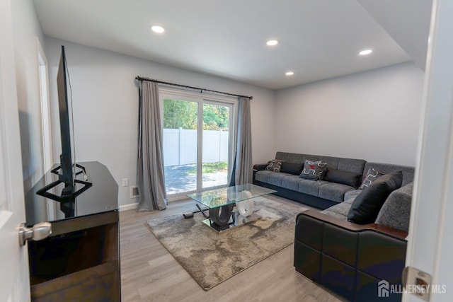 128 Jay St, Middlesex, NJ 08846 - living area featuring wood finished floors, recessed lighting, and baseboards