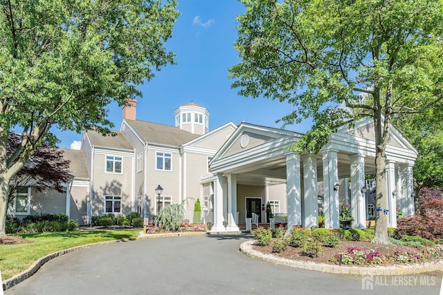 40 Rutland Ln Unit 40C, Monroe, NJ 08831 - view of building exterior featuring asphalt driveway