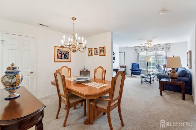 40 Rutland Ln Unit 40C, Monroe, NJ 08831 - dining area featuring light carpet, a chandelier, and a ceiling fan