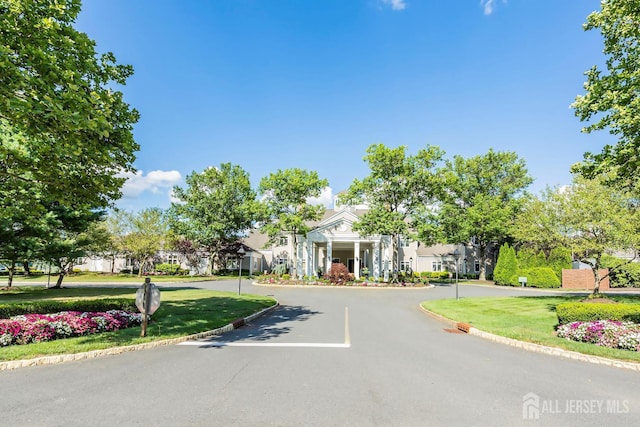 40 Rutland Ln Unit 40C, Monroe, NJ 08831 - view of asphalt road featuring curbs
