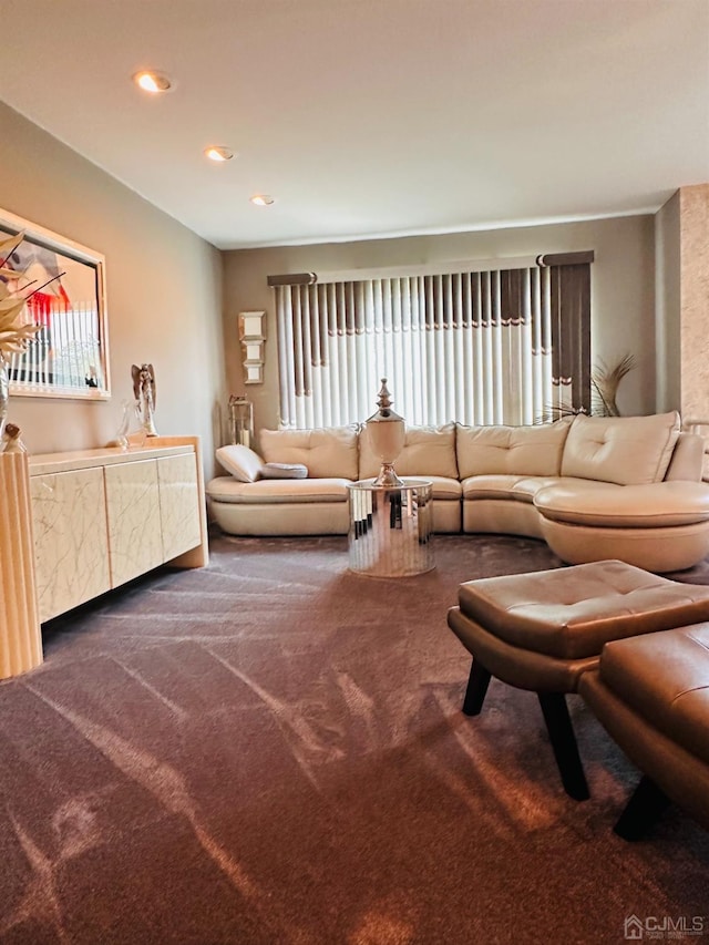 living room featuring dark carpet