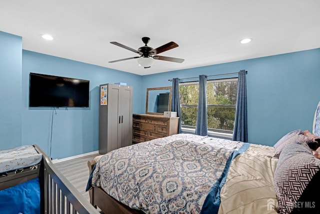 bedroom with a ceiling fan and recessed lighting
