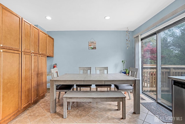 dining room featuring light tile patterned floors and recessed lighting
