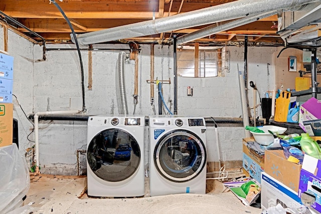 laundry area with separate washer and dryer and laundry area