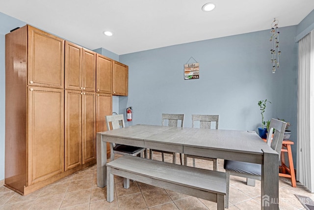 dining room featuring light tile patterned floors and recessed lighting