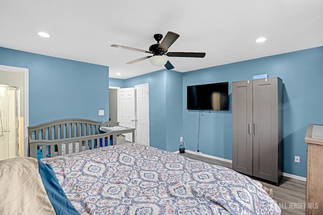 bedroom featuring ceiling fan, recessed lighting, baseboards, and wood finished floors