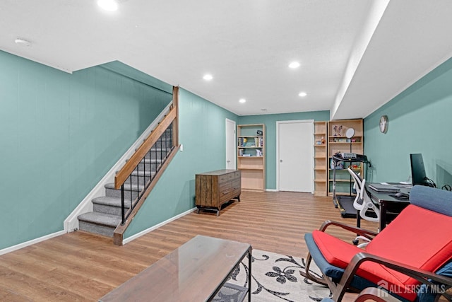 office featuring wood finished floors, baseboards, and recessed lighting