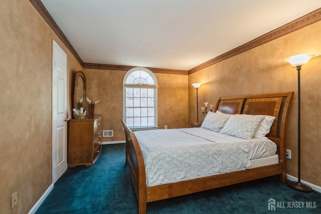 bedroom featuring ornamental molding, visible vents, dark colored carpet, and baseboards