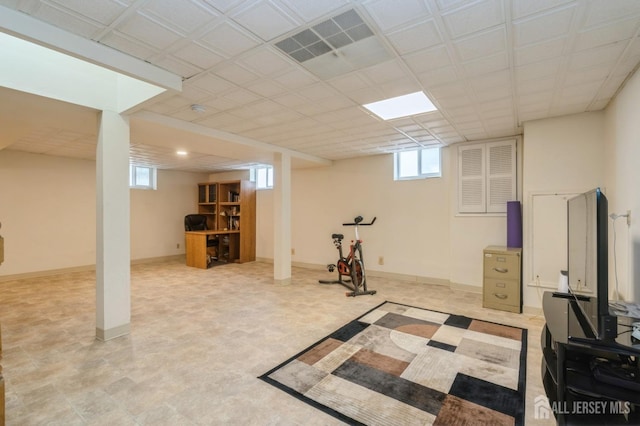 exercise area featuring visible vents and baseboards