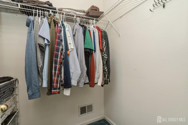 walk in closet with visible vents