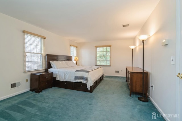 bedroom with visible vents, baseboards, and carpet flooring