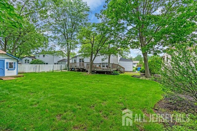 3 Topaz Ln, Iselin, NJ 08830 - view of yard with a wooden deck