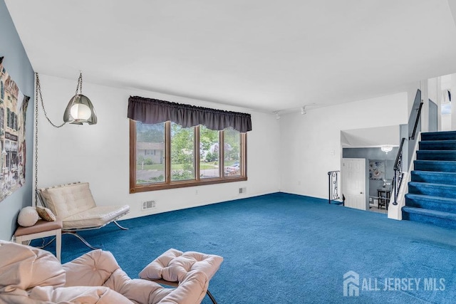 3 Topaz Ln, Iselin, NJ 08830 - living room featuring carpet, stairs, and rail lighting