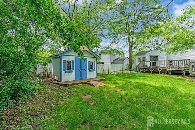 3 Topaz Ln, Iselin, NJ 08830 - fenced backyard with a deck and a storage unit