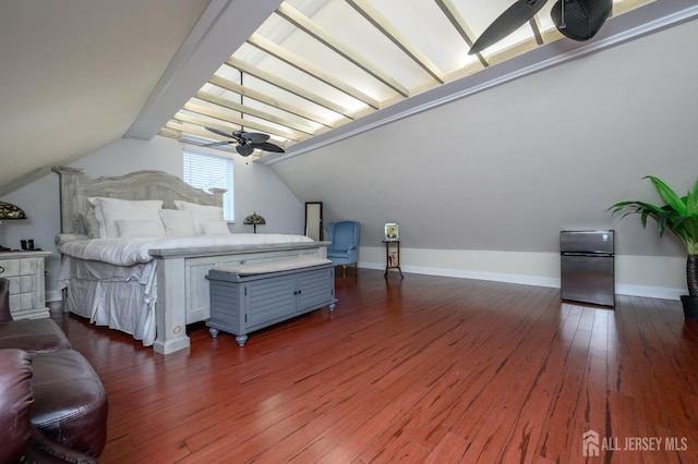 1156 Kline Pl, Rahway, NJ 07065 - bedroom with dark wood finished floors, freestanding refrigerator, and lofted ceiling