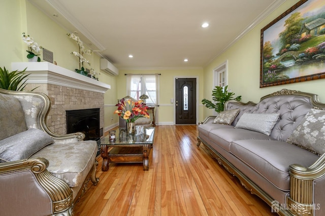 1156 Kline Pl, Rahway, NJ 07065 - living room featuring crown molding, light wood-type flooring, an AC wall unit, a brick fireplace, and recessed lighting