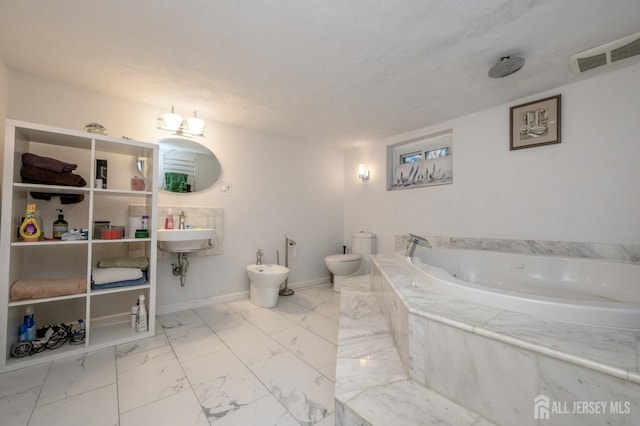 1156 Kline Pl, Rahway, NJ 07065 - full bath with a garden tub, marble finish flooring, and a bidet