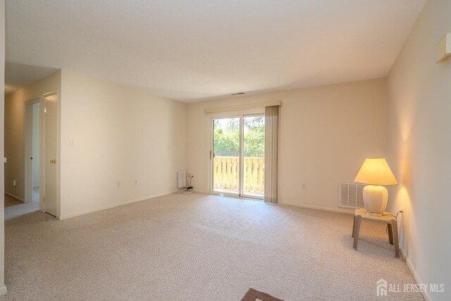 5108 Ravens Crest Dr, Plainsboro, NJ 08536 - carpeted spare room with baseboards