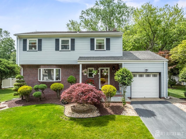 44 Frost Ave, East Brunswick, NJ 08816 - view of front of home featuring driveway, a garage, a front lawn, and a chimney
