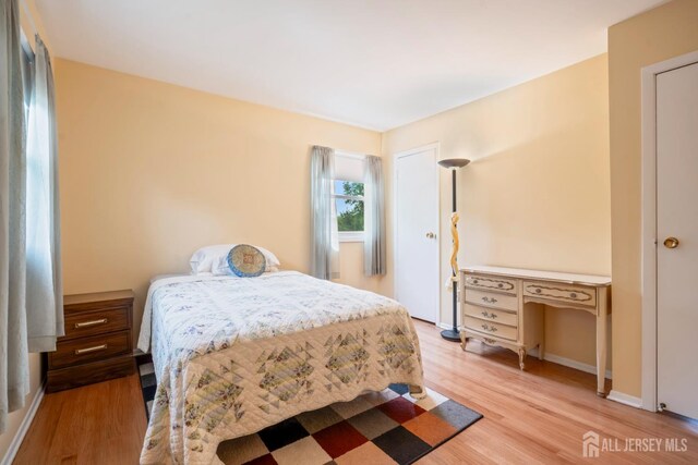 44 Frost Ave, East Brunswick, NJ 08816 - bedroom with wood finished floors and baseboards