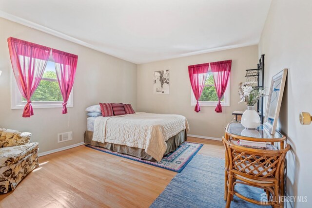 44 Frost Ave, East Brunswick, NJ 08816 - bedroom featuring wood finished floors and baseboards