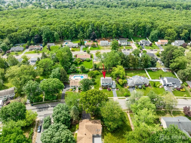 44 Frost Ave, East Brunswick, NJ 08816 - view of property location with a heavily wooded area and nearby suburban area