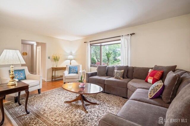 44 Frost Ave, East Brunswick, NJ 08816 - living room featuring light wood-style floors and baseboards
