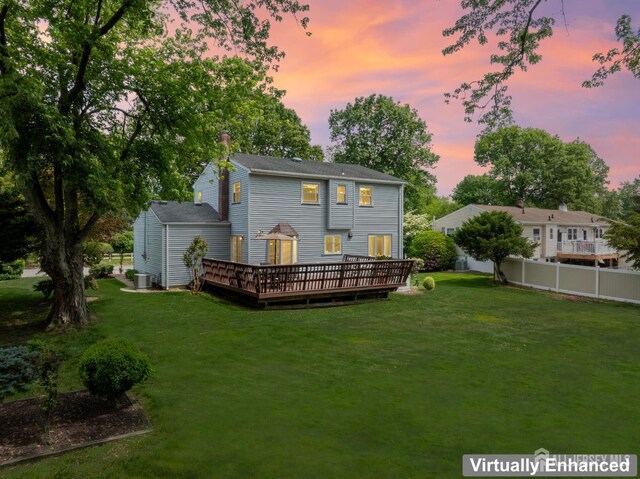 44 Frost Ave, East Brunswick, NJ 08816 - rear view of house with a deck and central AC