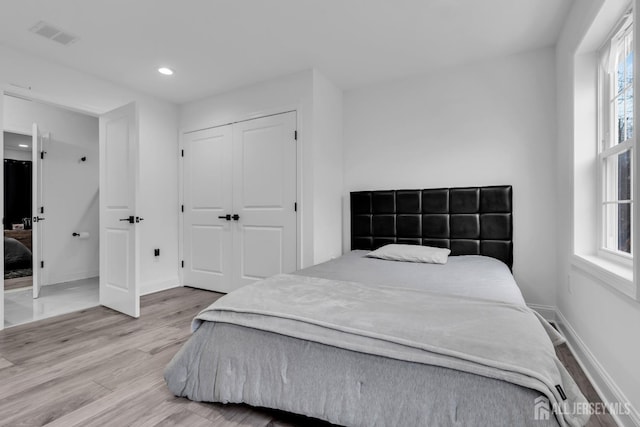 131-B Dutch Rd, East Brunswick, NJ 08816 - bedroom featuring light wood-style flooring, recessed lighting, baseboards, and a closet