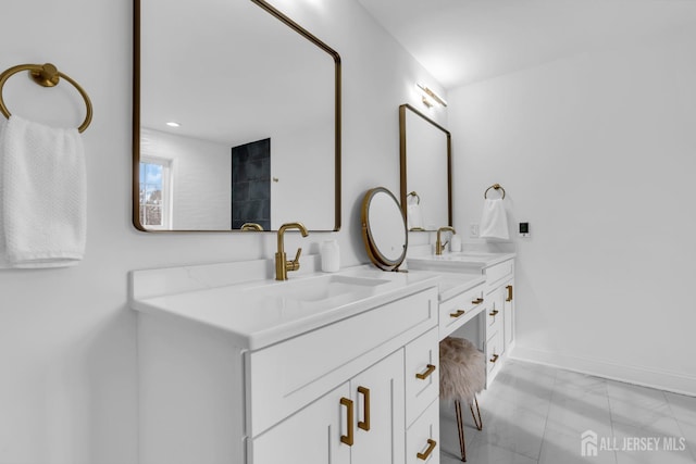131-B Dutch Rd, East Brunswick, NJ 08816 - full bath featuring marble look tile flooring, double vanity, and baseboards