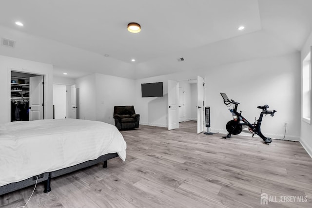131-B Dutch Rd, East Brunswick, NJ 08816 - bedroom featuring recessed lighting, light wood-type flooring, baseboards, and a walk in closet