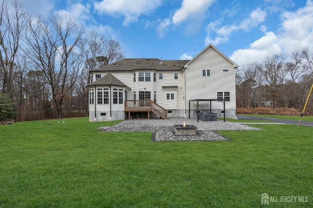 131-B Dutch Rd, East Brunswick, NJ 08816 - back of house with an outdoor fire pit, a yard, a deck, and a patio