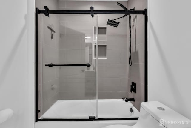 131-B Dutch Rd, East Brunswick, NJ 08816 - bathroom with toilet and shower / bath combination with glass door