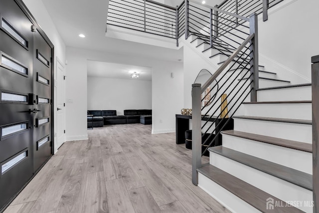 131-B Dutch Rd, East Brunswick, NJ 08816 - foyer featuring stairway, wood finished floors, recessed lighting, and baseboards