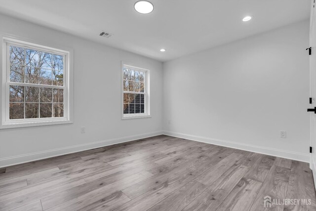 131-B Dutch Rd, East Brunswick, NJ 08816 - unfurnished room with healthy amount of natural light, wood finished floors, recessed lighting, and baseboards