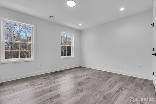 131-B Dutch Rd, East Brunswick, NJ 08816 - empty room with plenty of natural light, wood finished floors, and recessed lighting
