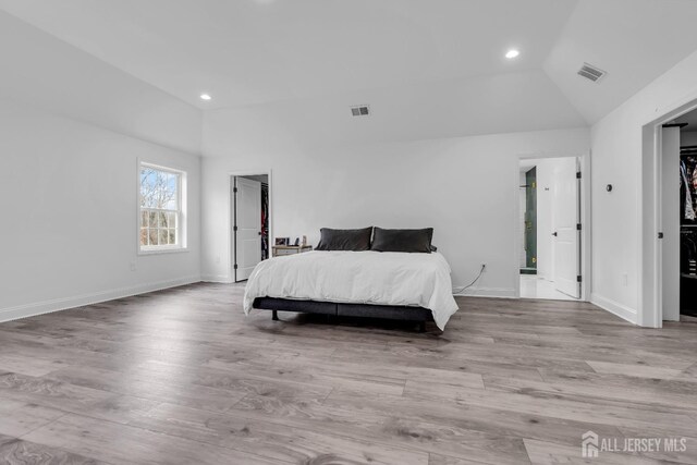 131-B Dutch Rd, East Brunswick, NJ 08816 - bedroom featuring vaulted ceiling, wood finished floors, recessed lighting, and baseboards