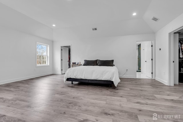 131-B Dutch Rd, East Brunswick, NJ 08816 - bedroom with vaulted ceiling, wood finished floors, and recessed lighting
