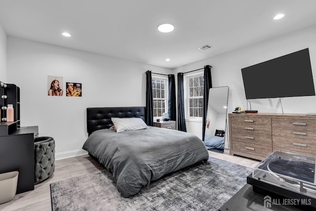 131-B Dutch Rd, East Brunswick, NJ 08816 - bedroom with light wood-style floors, recessed lighting, and baseboards