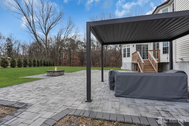 131-B Dutch Rd, East Brunswick, NJ 08816 - view of patio / terrace featuring a fire pit