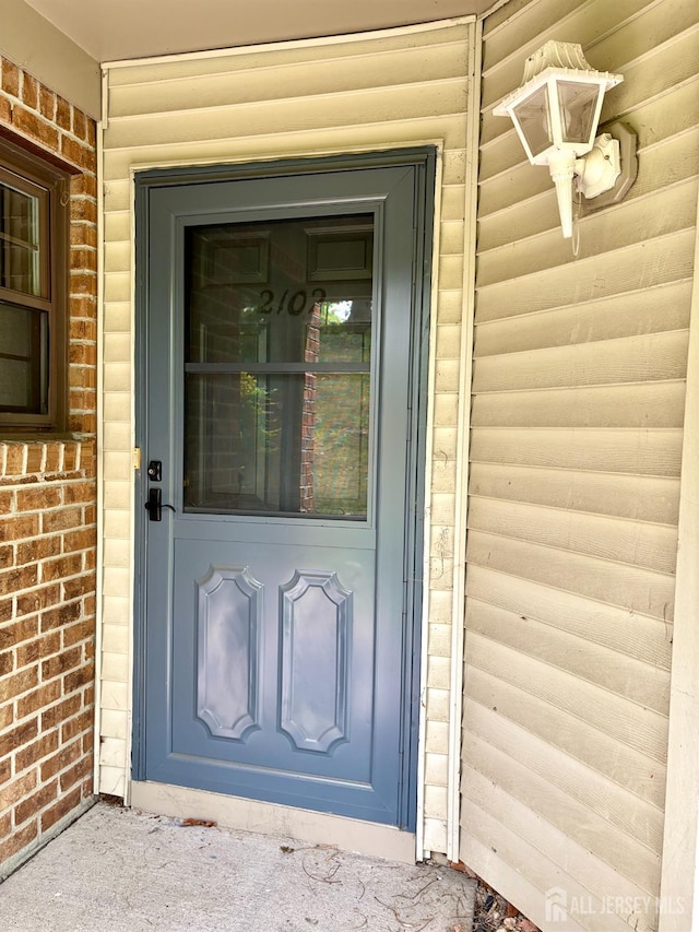 2102 Bayhead Dr Unit 2102, Sayreville, NJ 08859 - entrance to property featuring brick siding
