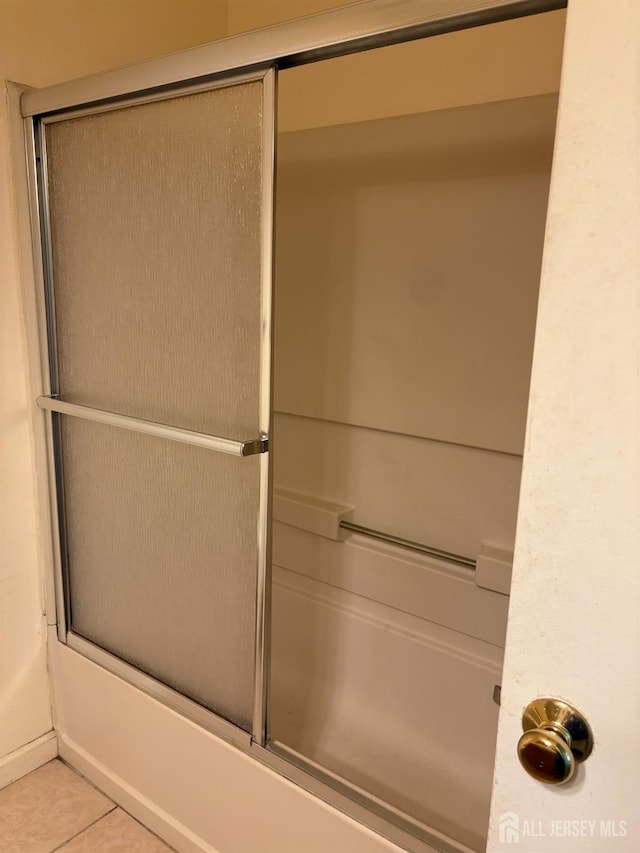 2102 Bayhead Dr Unit 2102, Sayreville, NJ 08859 - full bath with shower / bath combination with glass door and tile patterned floors