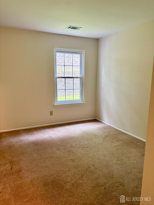 2102 Bayhead Dr Unit 2102, Sayreville, NJ 08859 - spare room featuring carpet flooring and baseboards