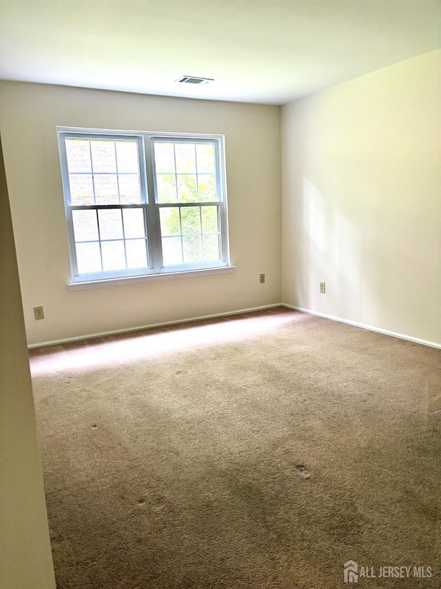 2102 Bayhead Dr Unit 2102, Sayreville, NJ 08859 - empty room with carpet floors and baseboards