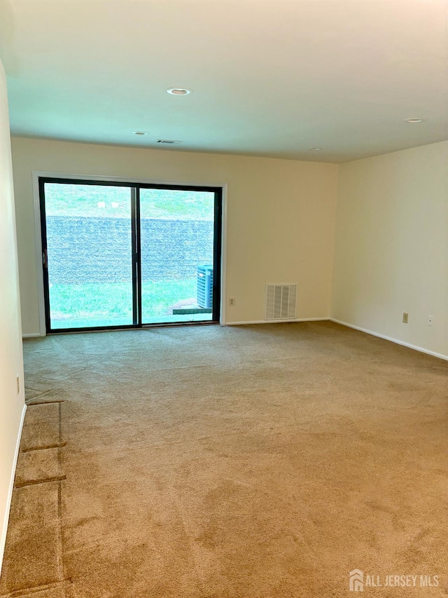 2102 Bayhead Dr Unit 2102, Sayreville, NJ 08859 - carpeted spare room featuring plenty of natural light and recessed lighting