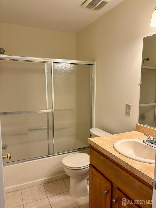2102 Bayhead Dr Unit 2102, Sayreville, NJ 08859 - bathroom featuring vanity, tile patterned floors, and enclosed tub / shower combo